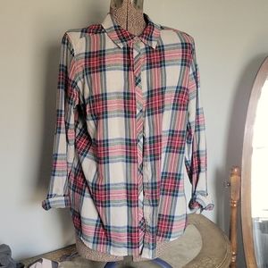 Plaid button up long sleeve shirt.